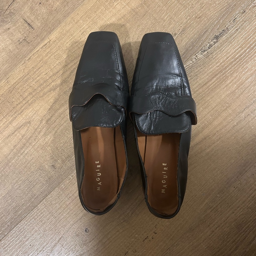 black leather loafers